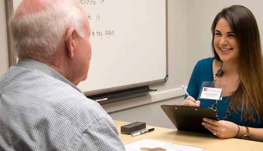 graduate clinician working with a client in the adult clinic